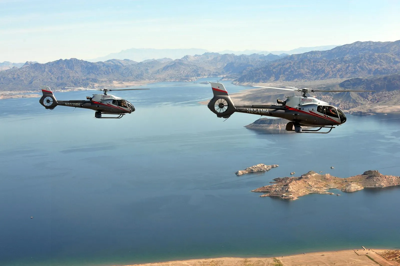 Two helicopters crossing Lake Mead on the flight out from Las Vegas