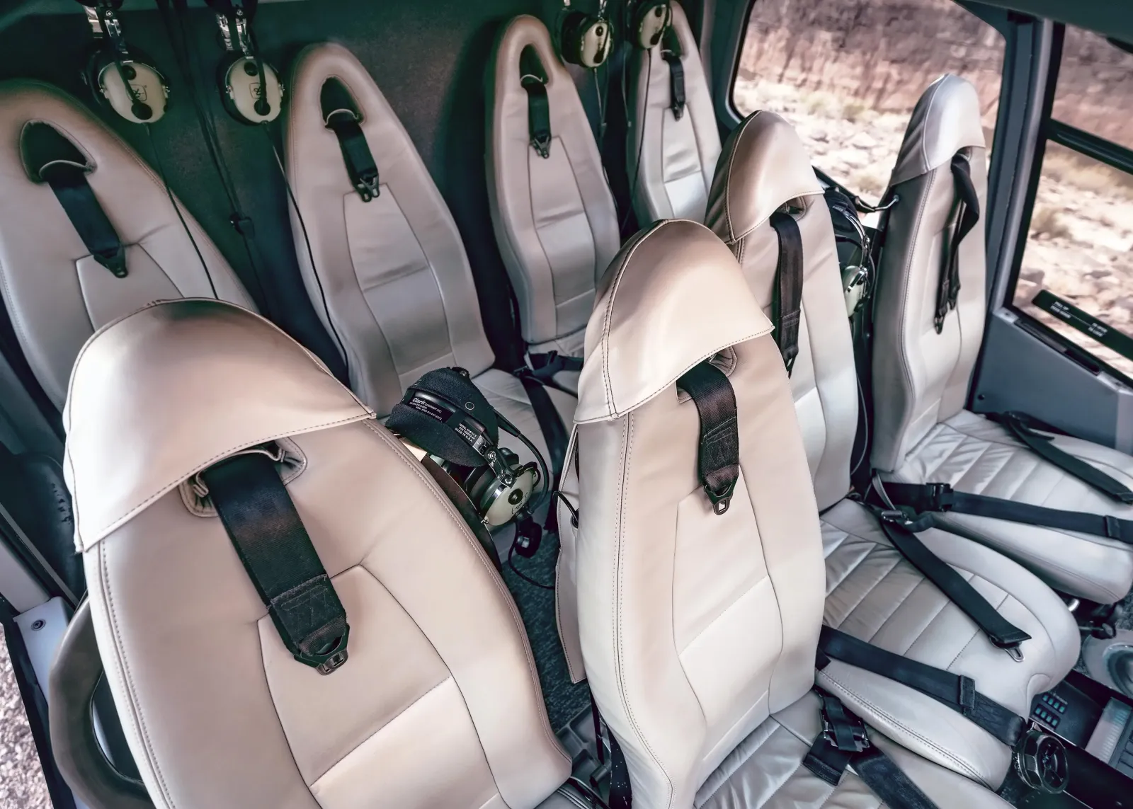 Cabin interior of the EC130 showing the leather seats and wrap-around windows